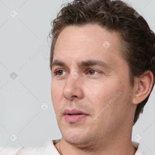 Neutral white adult male with short  brown hair and brown eyes