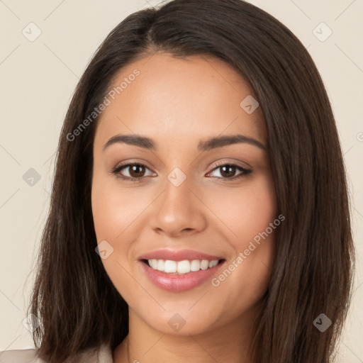 Joyful white young-adult female with long  brown hair and brown eyes