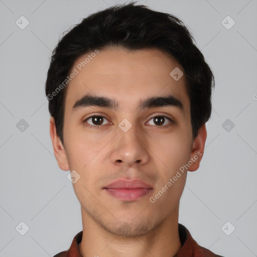 Neutral white young-adult male with short  black hair and brown eyes