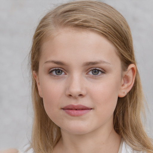 Joyful white child female with medium  brown hair and blue eyes