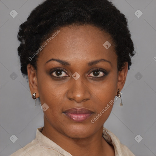 Joyful black young-adult female with short  brown hair and brown eyes