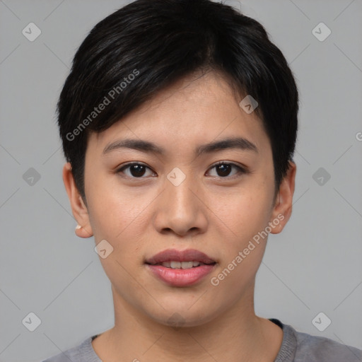 Joyful asian young-adult female with short  black hair and brown eyes