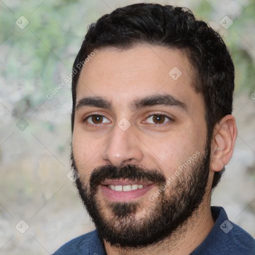 Joyful white young-adult male with short  black hair and brown eyes