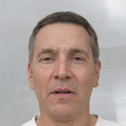 Neutral white adult male with short  brown hair and brown eyes