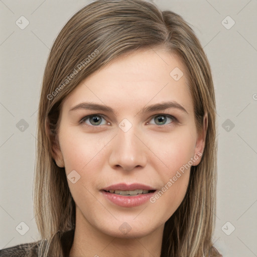 Joyful white young-adult female with long  brown hair and grey eyes