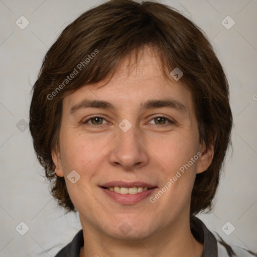 Joyful white adult female with medium  brown hair and grey eyes