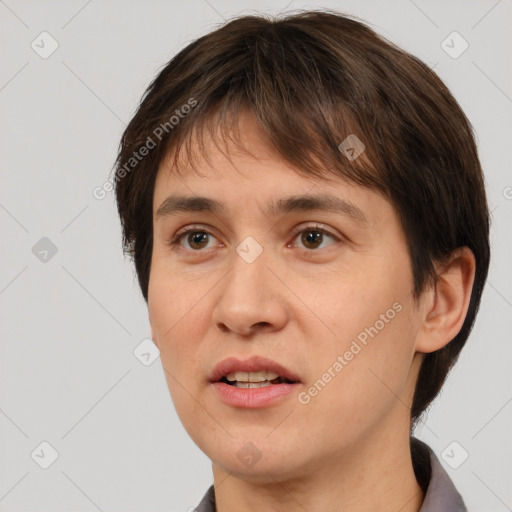 Joyful white young-adult female with short  brown hair and brown eyes