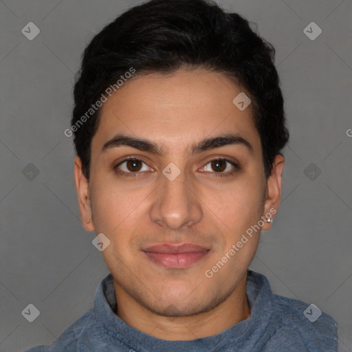 Joyful latino young-adult male with short  black hair and brown eyes