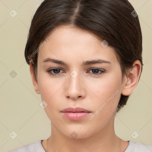 Neutral white young-adult female with medium  brown hair and brown eyes