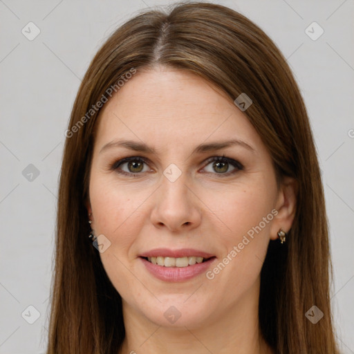 Joyful white young-adult female with long  brown hair and grey eyes