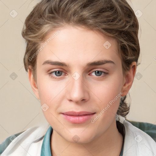 Joyful white young-adult female with short  brown hair and grey eyes