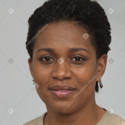 Joyful black young-adult female with short  black hair and brown eyes