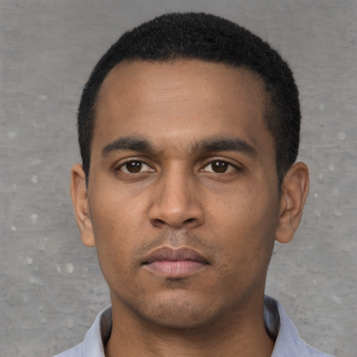 Neutral latino young-adult male with short  brown hair and brown eyes