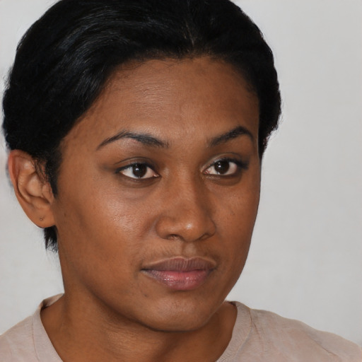 Neutral black young-adult female with short  black hair and brown eyes