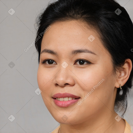 Joyful asian young-adult female with medium  brown hair and brown eyes