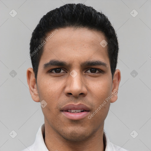 Neutral latino young-adult male with short  black hair and brown eyes