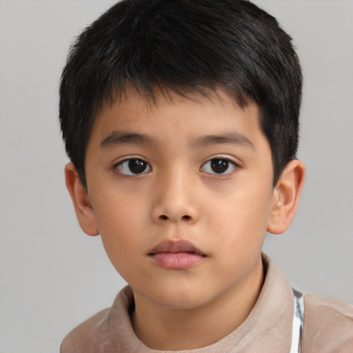 Neutral asian child male with short  brown hair and brown eyes