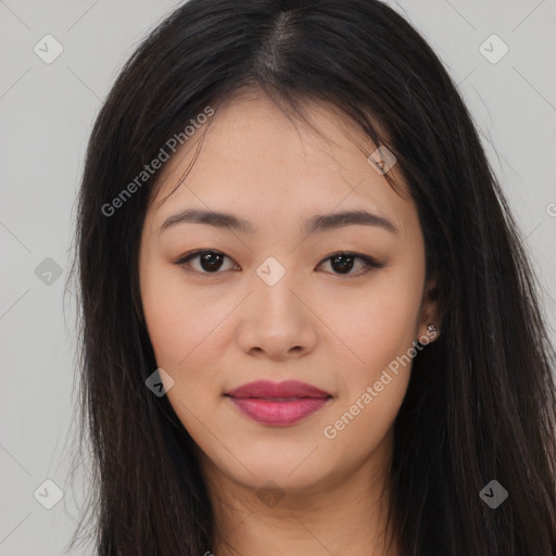 Joyful asian young-adult female with long  brown hair and brown eyes