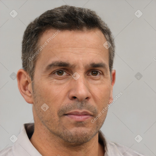 Neutral white adult male with short  brown hair and brown eyes