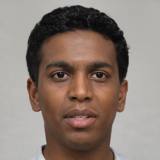 Neutral black young-adult male with short  black hair and brown eyes