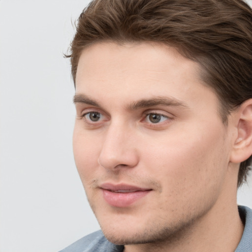 Neutral white young-adult male with short  brown hair and grey eyes