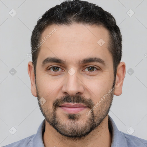 Joyful white young-adult male with short  black hair and brown eyes