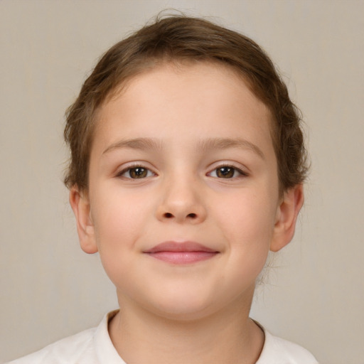 Joyful white child female with short  brown hair and brown eyes