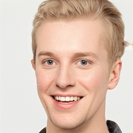 Joyful white young-adult male with short  brown hair and blue eyes