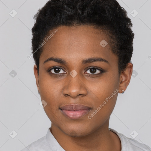 Joyful black young-adult female with short  black hair and brown eyes