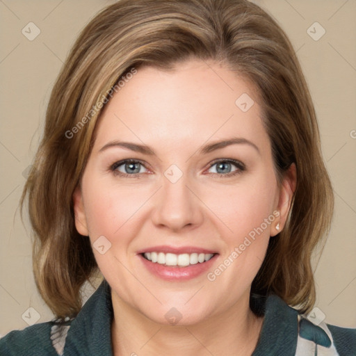 Joyful white young-adult female with medium  brown hair and blue eyes