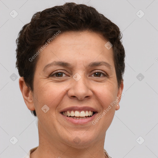 Joyful white adult female with short  brown hair and brown eyes