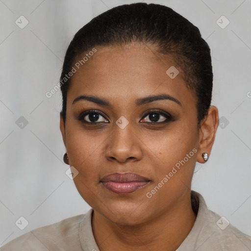 Joyful black young-adult female with short  black hair and brown eyes