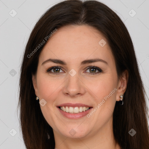 Joyful white young-adult female with long  brown hair and grey eyes