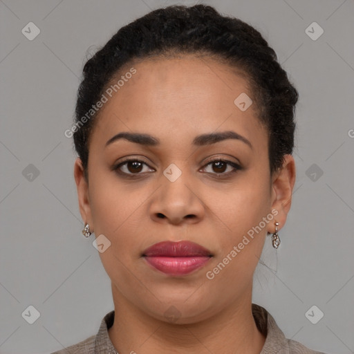 Joyful latino young-adult female with short  brown hair and brown eyes