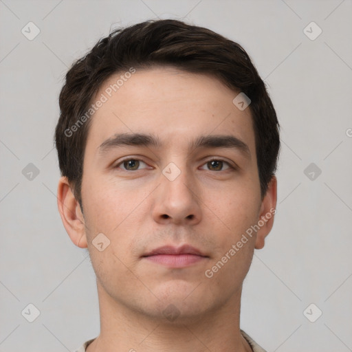 Neutral white young-adult male with short  brown hair and brown eyes