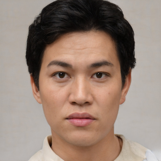 Neutral asian young-adult male with short  black hair and brown eyes