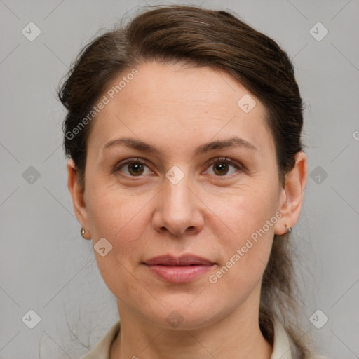 Joyful white adult female with short  brown hair and grey eyes