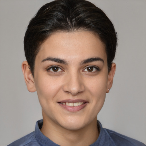 Joyful white young-adult female with short  brown hair and brown eyes