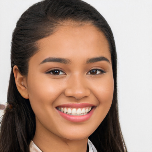 Joyful latino young-adult female with long  brown hair and brown eyes