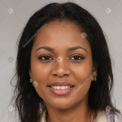 Joyful black young-adult female with long  brown hair and brown eyes