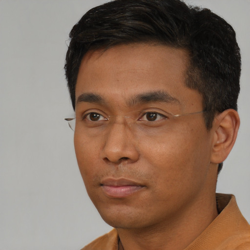 Neutral asian young-adult male with short  black hair and brown eyes