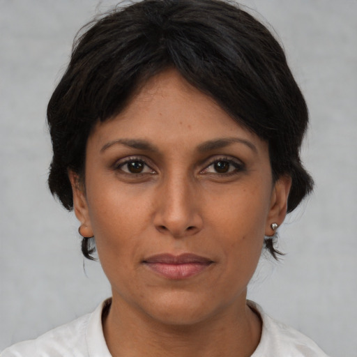 Neutral asian young-adult female with short  brown hair and brown eyes