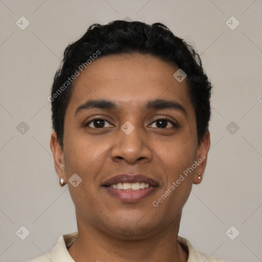 Joyful latino young-adult male with short  black hair and brown eyes