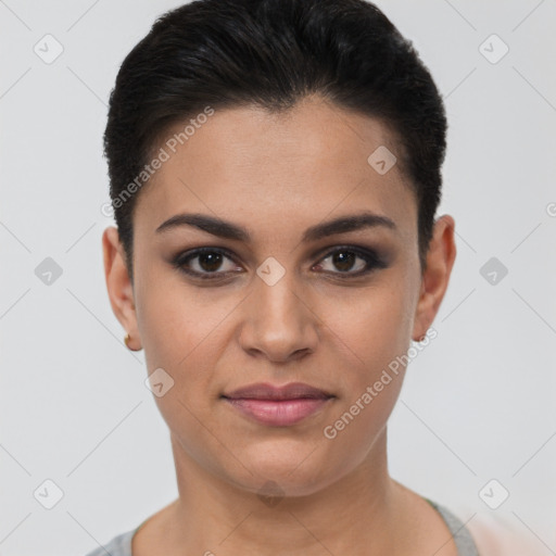 Joyful latino young-adult female with short  brown hair and brown eyes