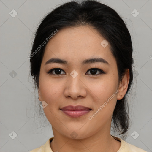 Joyful asian young-adult female with medium  brown hair and brown eyes