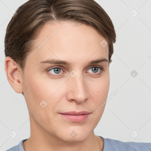 Joyful white young-adult female with short  brown hair and grey eyes