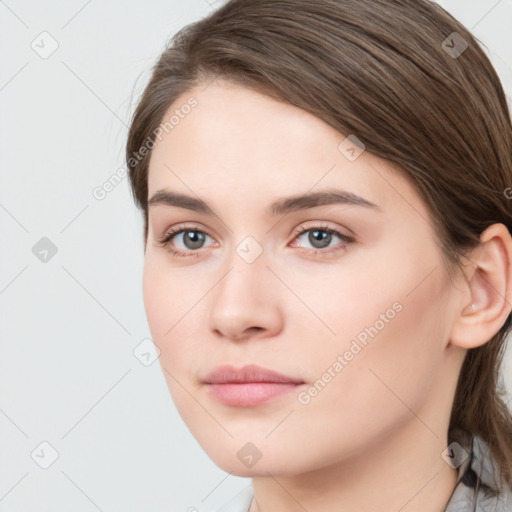 Neutral white young-adult female with medium  brown hair and brown eyes