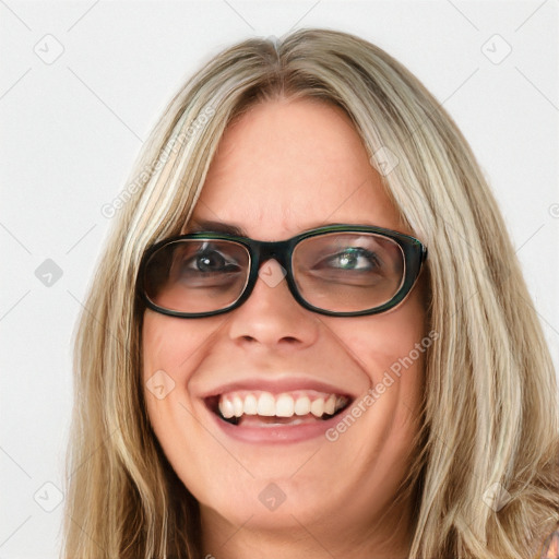 Joyful white young-adult female with long  brown hair and blue eyes