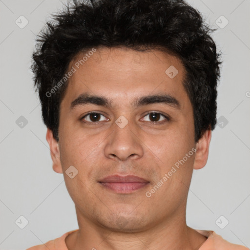 Joyful white young-adult male with short  black hair and brown eyes