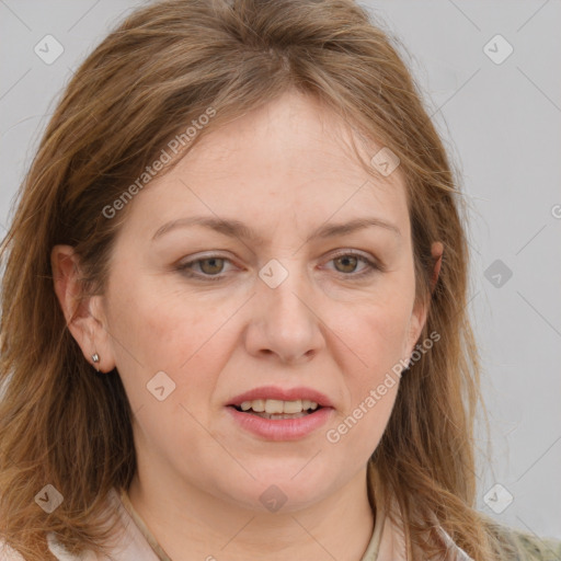 Joyful white adult female with long  brown hair and grey eyes